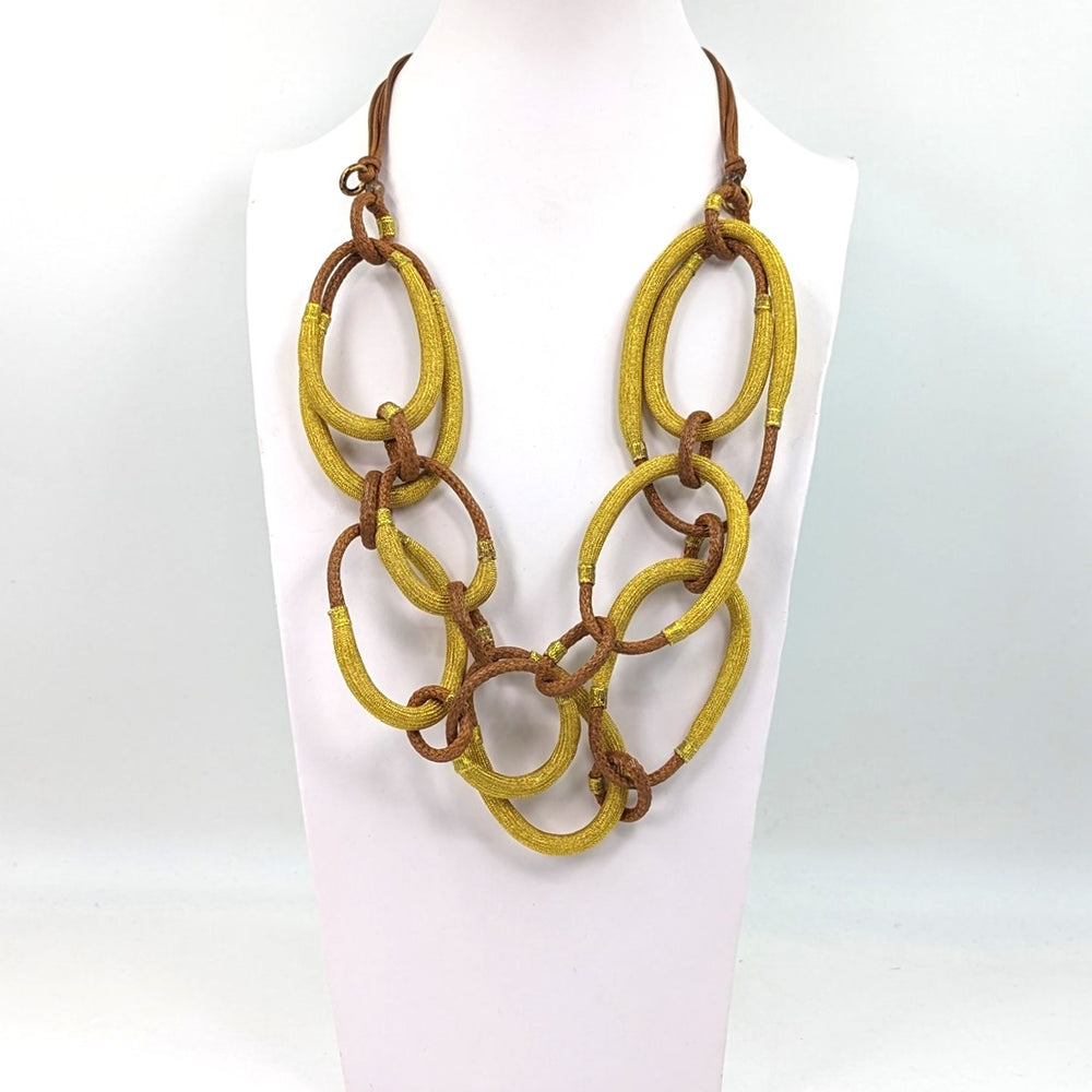 Tempest Luxury necklace with metallic fabric interlinked rings UJ094N