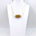 Tempest Simple pearlised resin barrel component luxury necklace on multi wax cord UJ095N